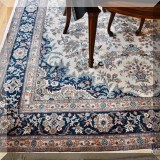D11. Hand knotted Oriental rug. Measures approx. 9' x 12' 